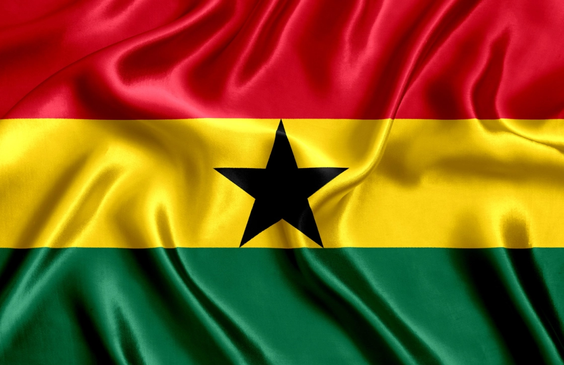 Close-up of the national flag of Ghana waving in the wind